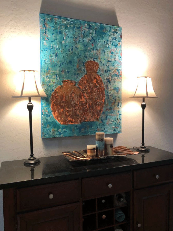 Picture of Southwest Terracotta painting on wall above credenza